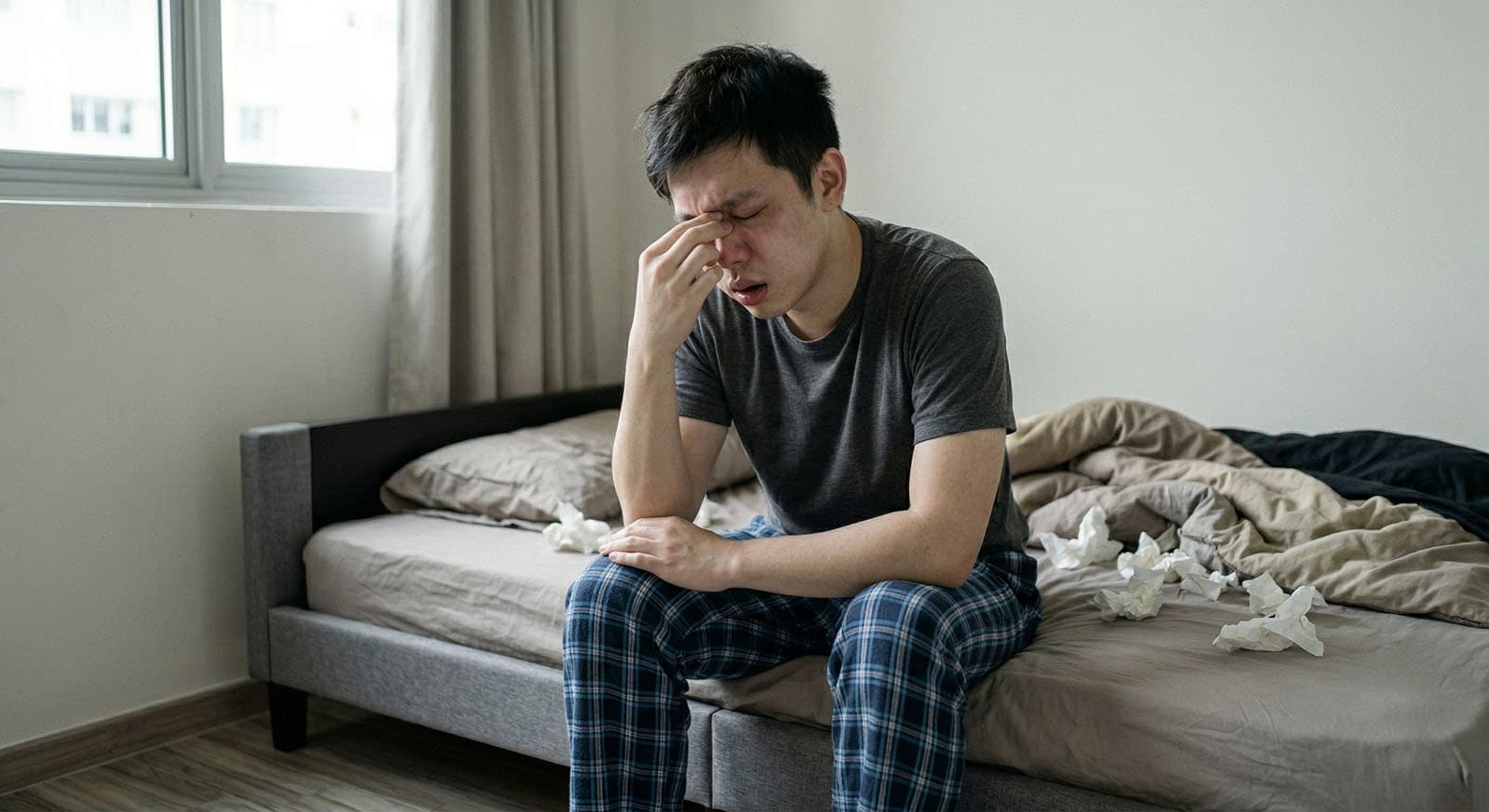 Man suffering from ENT discomfort